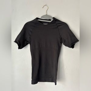 Spanx black, short sleeve compression tee. Women’s size large.